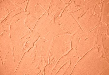 Peach Fuzz toned colour grunge decorative wall background. Art rough stylized texture banner trendy color 2024. Grunge Peach Fuzz color texture
