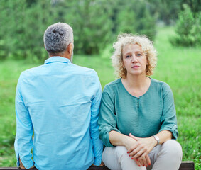 problem conflict woman man couple divorce wife husband mid age senior mature anger married sad...