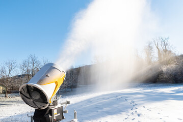  cannon is producing artificial snow for ski slopes in Cunardo sky resort, province of Varese,...