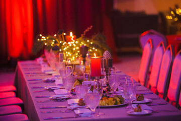 decorated New Year's table with a candle