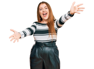 Young beautiful redhead woman wearing elegant clothes looking at the camera smiling with open arms for hug. cheerful expression embracing happiness.