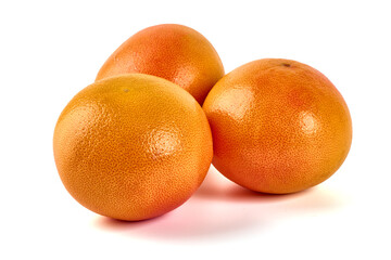 Red grapefruits, isolated on white background.