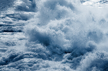 big giant waves breaking on a stormy day in atlantic sea ocean