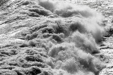 big giant waves breaking on a stormy day in atlantic sea ocean