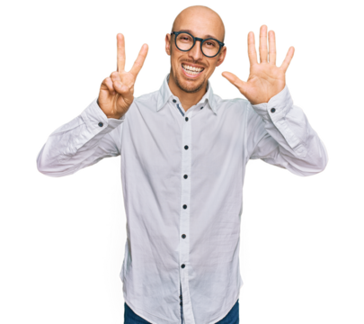 Bald man with beard wearing business shirt and glasses showing and pointing up with fingers number seven while smiling confident and happy.