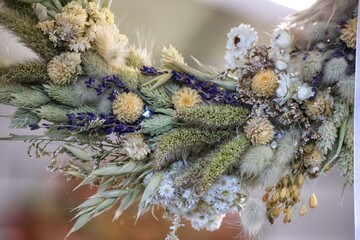 A bouquet of dried flowers, herbs and cereals. Close up.