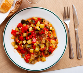 Stew with peppers, zucchini and zucchini in plate.Traditional Hungarian dish called lecho