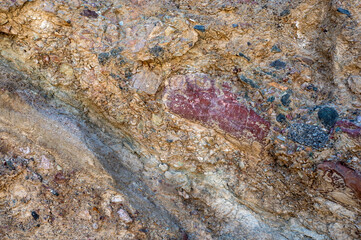 Formations of multicolored rocks, abstract design backgrounds, patterns, textures. Geology theme