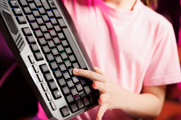 Close up shot of talented girl presenting latest gaming computer peripheral tech on her online...
