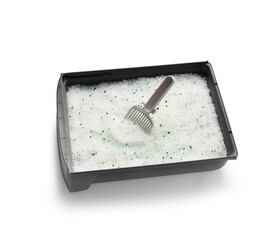 Cat litter box, gray tray filled with silica gel crystals and a cleaning shovel on a white...