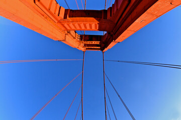 View up at South Tower. Golden Gate Bridge with suspension cables, San Francisco, California