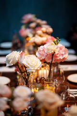 Close up of Wedding table decorated with flowers. Table set for wedding or another catered event dinner.