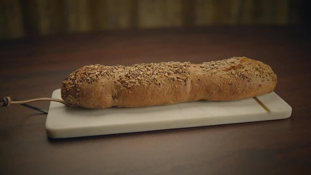 Organic Whole Grain Bread on Kitchen Table Ready for Eating 