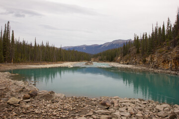 Green and blue Athabasca river in Alberta, Canada