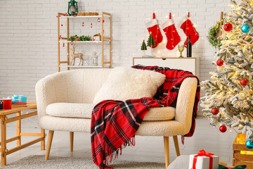 Obraz premium Interior of stylish living room with beautiful Christmas tree