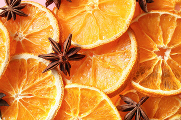 Texture of dried orange slices and star anise as background