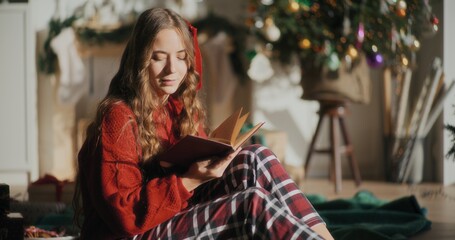 Portrait Of Woman Enjoying Christmas Holidays At Home