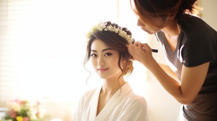 The hairstylist assists the Japanese bride with dressing and hairstyling before entering the wedding ceremony, ensuring an elegant and culturally adorned appearance for the special occasion.