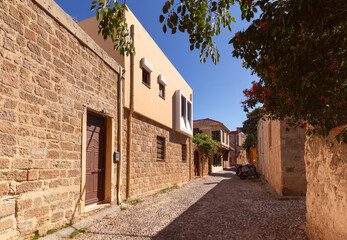Fototapeta na wymiar Old medieval street in the historical part of Rhodes.