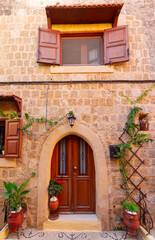 Fototapeta na wymiar Old medieval street in the historical part of Rhodes.