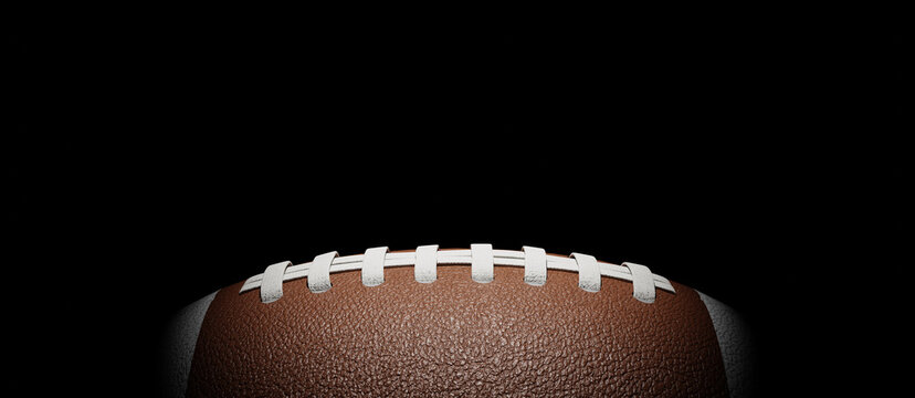 Black copy space background with partial illumination on the football, 3d rendering