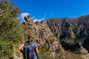 Female Hiker Above McKittrick Canyon on The Notch Trail, McKittrick Canyon, Guadalupe Mountains National Park, Texas, USA