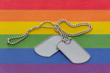 Soldier's medallion on the LGBT flag. Concept: Gay and lesbian soldiers serving in the military, recognition in society.