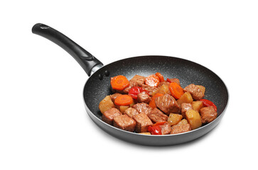 Frying pan with delicious goulash isolated on white