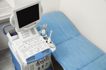 Ultrasound machine and examination table in hospital, above view