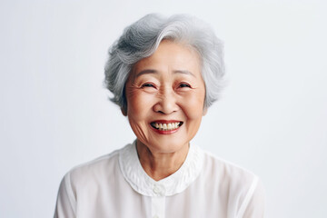 Portrait of a happy smiling asian senior woman. High quality photo