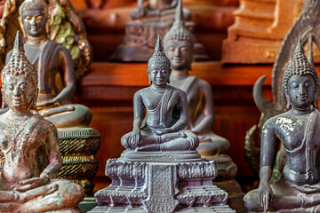 The altar of the Old Buddha statue stands in the house for worship.