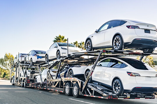 Sep 23, 2020 Fremont / CA / USA - Tesla Model 3 new vehicles on a transportation trailer