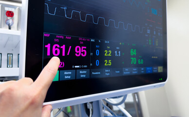 hospital monitor displaying vital signs and hemodynamics, illustrating healthcare and patient monitoring