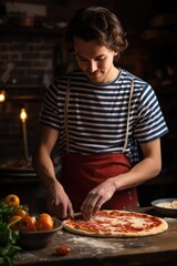 Fototapeta na wymiar Young man preparing pizza