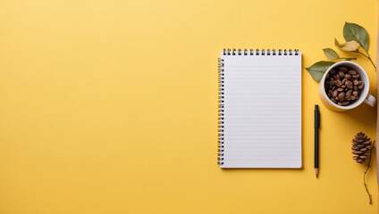 top view notebook over yellow table background. Backdrop with copy space	