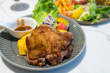 Grill chicken fillet with salad dish in restaurant