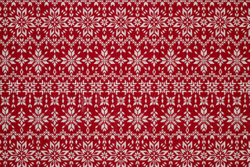 White snowflakes on a red background wrapping paper. Christmas Holiday concept.