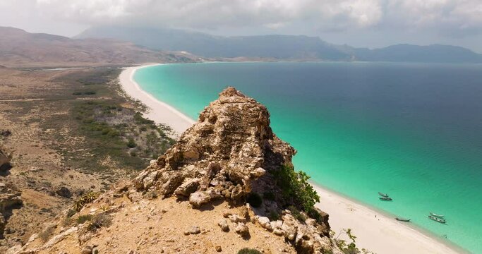 Reveal Rugged Mountains Over Shoab Beach, Socotra Island, Yemen. Aerial Drone Shot
