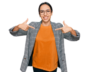 Young hispanic girl wearing business jacket and glasses looking confident with smile on face, pointing oneself with fingers proud and happy.