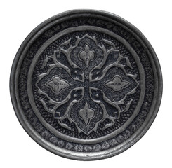 Classic metal plate. Ethnic plates. Old metal plate with hand engraving.
