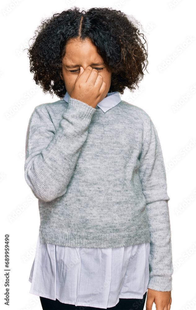 Sticker Young little girl with afro hair wearing casual clothes tired rubbing nose and eyes feeling fatigue and headache. stress and frustration concept.