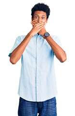 Young african american man wearing casual clothes shocked covering mouth with hands for mistake. secret concept.