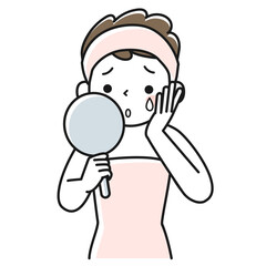 手鏡を見て悲しむ若い女性の上半身