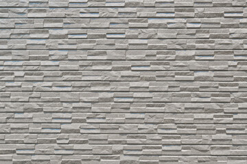 Bumpy stone, a timeless finishing material for exterior walls of buildings
