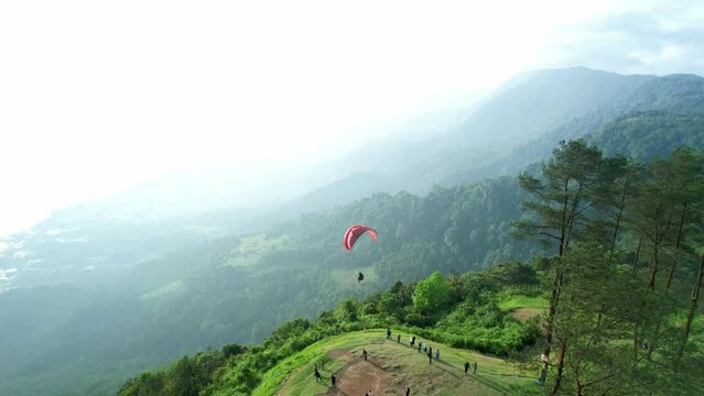 Aerial view of the paragliding attraction at Puncak Lawang, Agam Regency, West Sumatra
