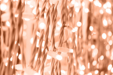 Background of garland lights in a delicate peach color. 