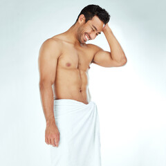 Cleaning, towel and happy fitness man in studio for wellness, hygiene or body care routine on white...