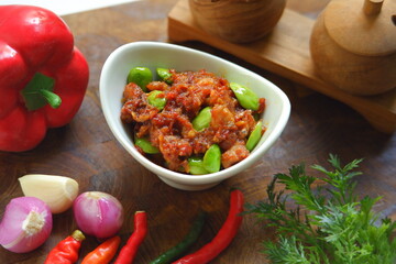 a bowl of sambal cumi petai
