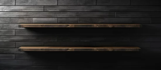 Rolgordijnen Empty wooden plank shelf with black brick wall background © ismodin
