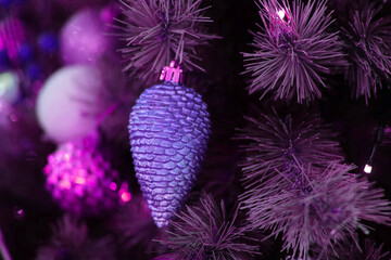 Christmas Ornaments Background. Violet, Purple Ornamented Glass Bauble. Christmas Tree with Globes,...